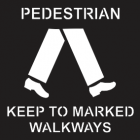 Pedestrains Keep To Marked Walkways Sign