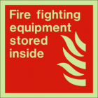 Fire fighting equipment stored inside sign
