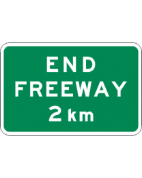End Freeway 2km Sign